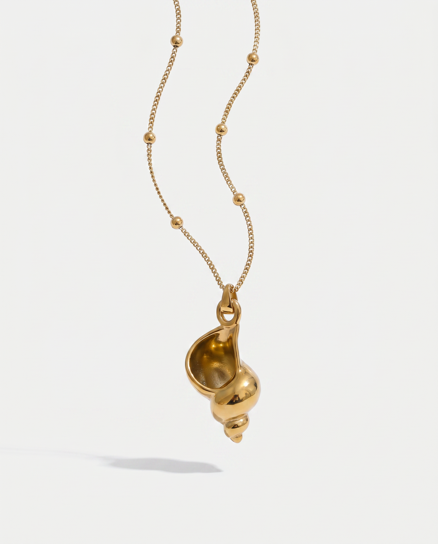 Coral Conch Pendant Necklace